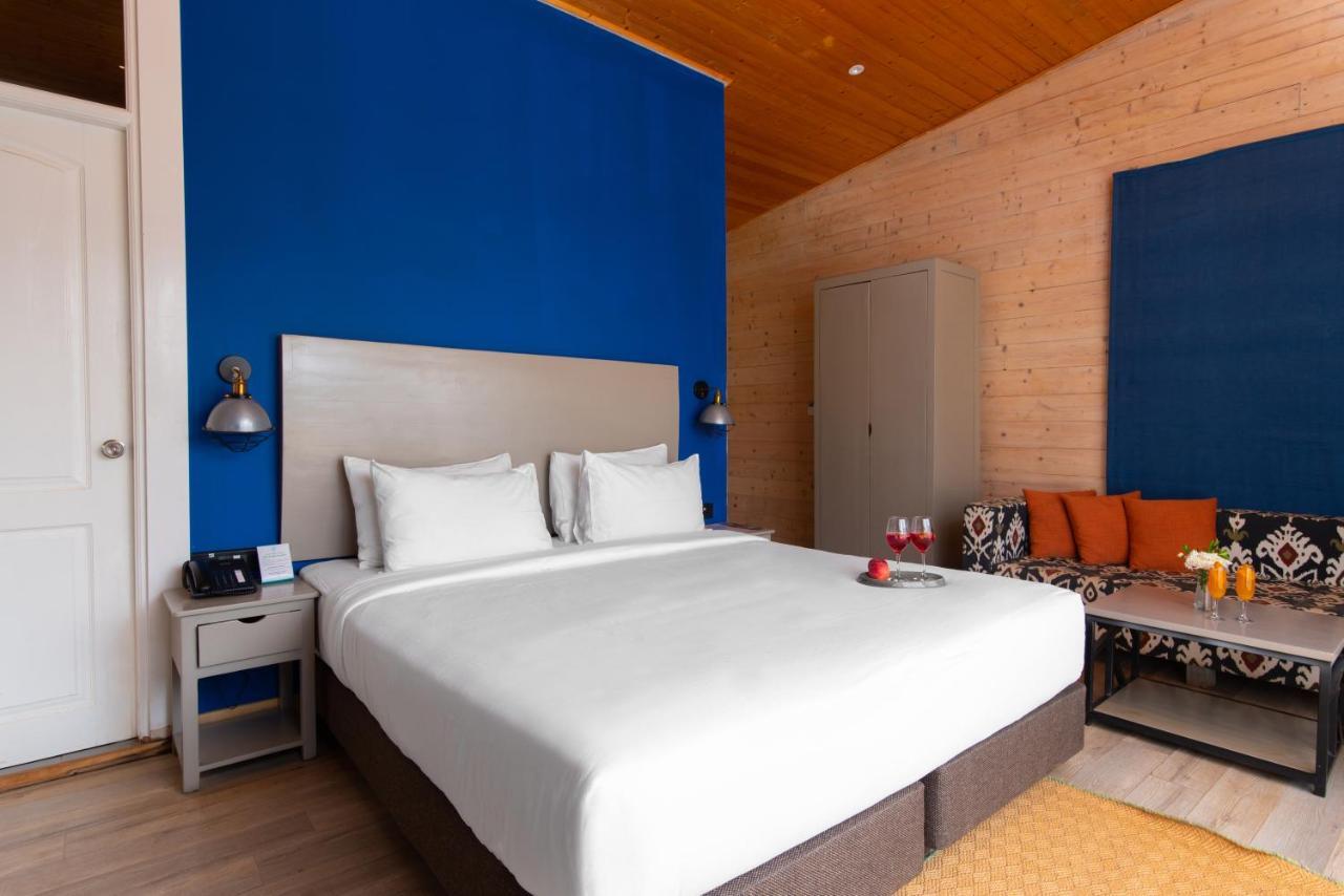 Living Room Beach Resort Morjim Exterior photo