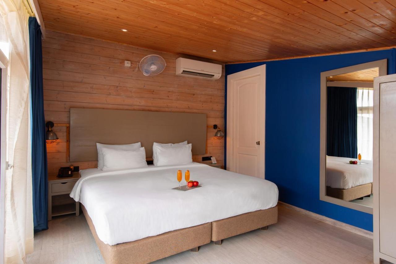 Living Room Beach Resort Morjim Exterior photo